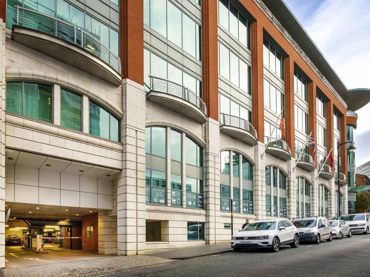 a large building with cars parked in front of it at ibis Styles Birmingham Centre in Birmingham